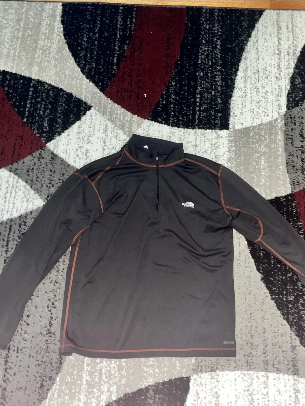 The North Face Men's Black Lightweight Quarter-Zip with Rust Contrast Stitching